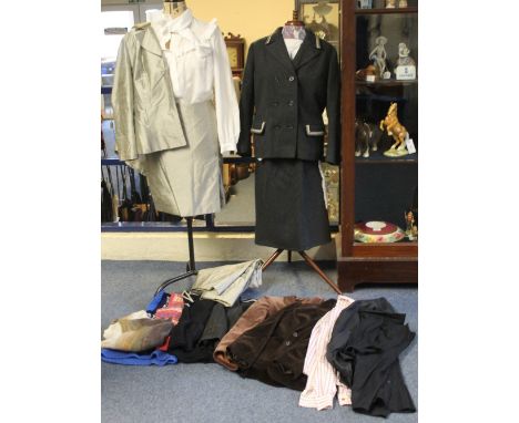 A box of vintage clothing (60's-80's) to include two brown velvet jackets, an Aquascutum blouse, two black shirts and a flowe