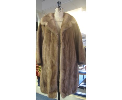 National Fur Company 3/4 length vintage mink fur coat.(B.P. 24% incl. VAT)   CONDITION REPORT:  No obvious damage to fur, emb