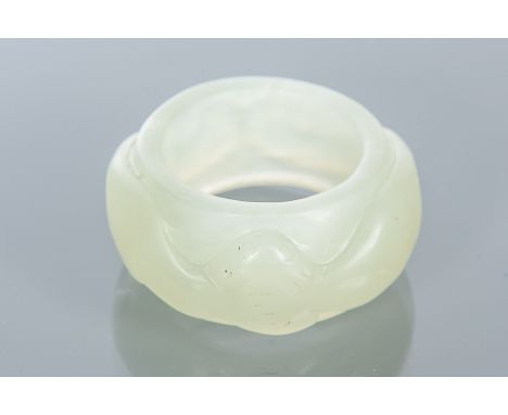 CHINESE CELADON JADE ARCHER'S RING
with a bat, external diameter 4cm 