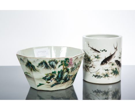 CHINESE CERAMIC BRUSH POT AND A PLANTER 
the brush pot with fish decoration and mark to base, 16.5cm high, the planter with l