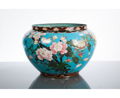 CHINESE CLOISONNE PLANTER AND CHARGER both decorated with foliate designs, the planter 21cm high, the charger 30cm diameter C