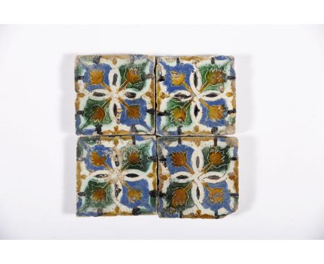 A four tile panelA four tile panel, polychrome decoration "Flowers" applied using the arista technique, Hispano-Arabic, 16th 
