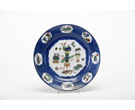 A large dishA large dish, Chinese export porcelain, polychrome decoration "Fortunbe objects", flap with blue decoration and p