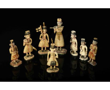 Eight chess pieces - white pawnsEight chess pieces - white pawns, carved, painted and gilt ivory, Indian - Rajasthan, 19th C.