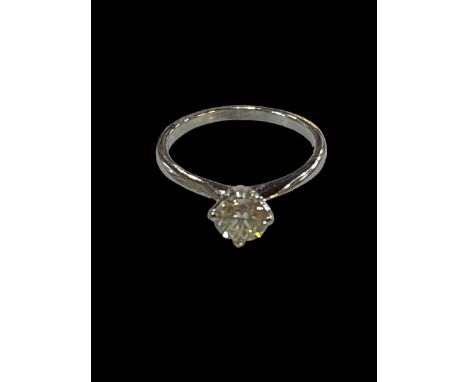 18 carat white gold solitaire diamond ring, diamond 0.79 carats, size M.