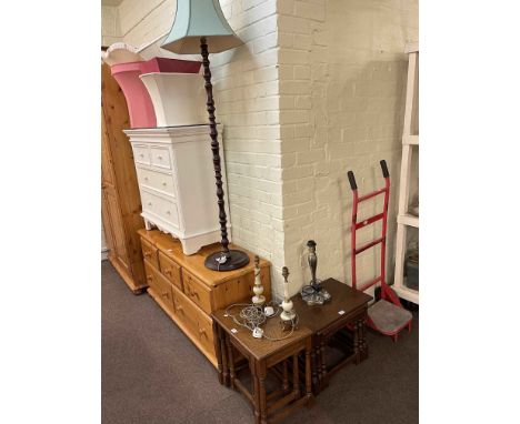 Two oak finish nests of tables, standard lamp and shade, three table lamps and collection of lamp shades.