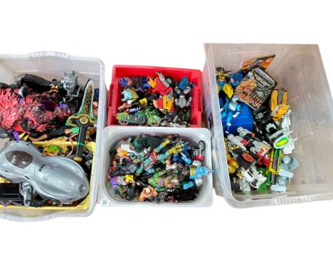 Four boxes of Teenage Mutant Ninja Turtles and various other toy figures, Bat Car, etc.