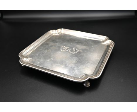A solid siver hallmarked square waiter/salver (London 1931 by R &amp; W Sorley 435g approx. Engraved with the Henderson and H
