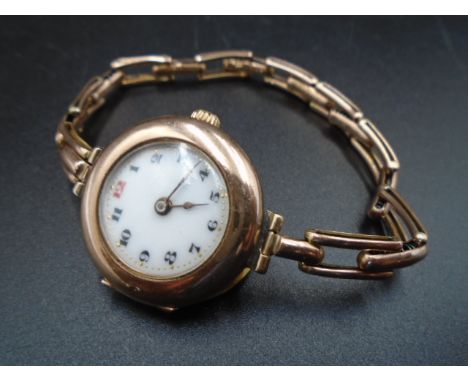 A vintage Rolex 9ct rose gold ladies coctail watch, with expanding band strap (9ct gold strap). Swiss made 15 jewels movement