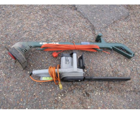 Titan electric chainsaw and Black & Decker strimmer both from a house clearance 