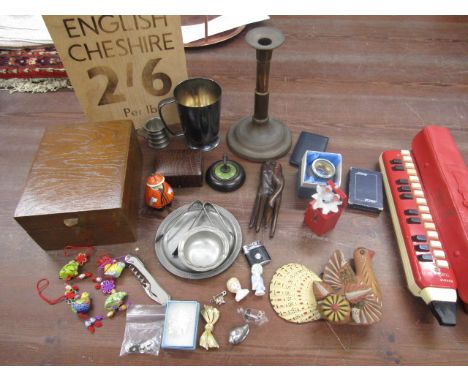 A collectors lot to inc porcelain doll heads, m.o.p brooch, pin brooch, Hohner music instrument, terracotta bird, wooden hand