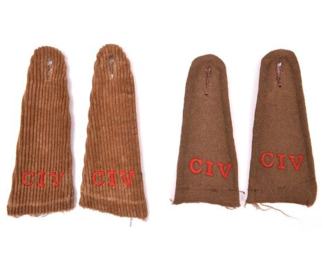 A pair of khaki cloth CIV epaulettes,  the “CIV” embroidered in red wool; and a similar pair, of light brown corduroy, both r