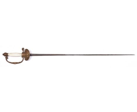 A late 19th century Dutch courtsword,  slender blade 28½” of concave triangular section, the embossed brass hilt having shell