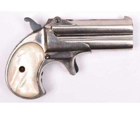 A .41” rim fire double barrelled over and under Remington Derringer pistol,  number 357, hinge up barrels 3” stamped “REMINGT