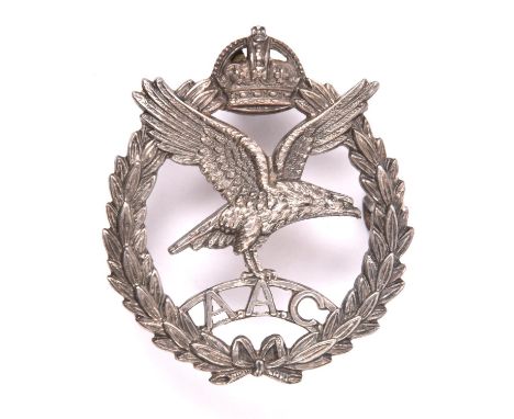 An officer’s silver cap badge of the Army Air Corps, HM B’ham 1942, with J R Gaunt maker’s mark and 3 silver lugs. VGC       