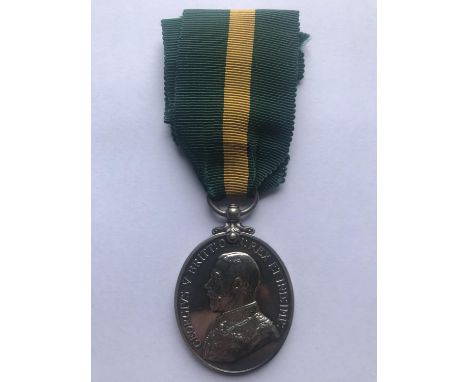 A GEORGE V TERRITORIAL FORCE EFFICIENCY MEDAL. A George V Territorial Force Medal named to '646 Sjt G. Cross 5/Devon R'. Sjt 