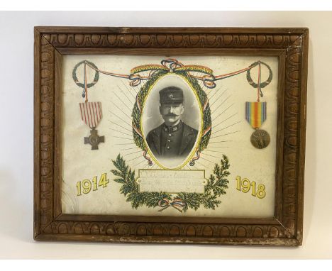 A FRENCH GREAT WAR PAIR AND MEMORIAL PHOTOGRAPH. A First World War French Croix Du Combattant and Allied Victory Medal, mount