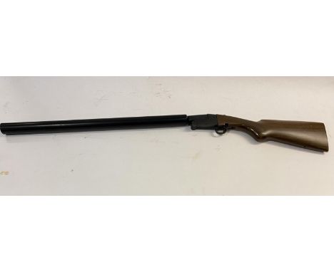 A HUSH POWER PEDRETTI MAGNUM 410 WITH MODERATOR. With a single 64cm barrel, the engraved side plate signed 'Enrico Pedretti',