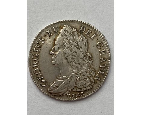 A GEORGE II HALFCROWN. A George II Halfcrown dated 1745, Lima below laureate and draped bust, Rim with Anno Regni Decimo Nono