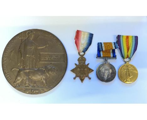 A FIRST WORLD WAR TRIO AND MEMORIAL PLAQUE TO A CASUALTY AT JUTLAND. A trio comprising 1914-15 Star named to MID R.G.B. Giffa