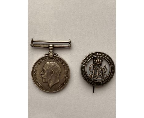 A FIRST WORLD WAR WAR BADGE TO THE TANK CORPS. A Silver War badge number B156900 awarded to H.S.Phelpe 304712 of the Royal Ta