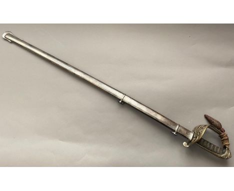 AN 1845 PATTERN INFANTRY OFFICERS SWORD AND SCABBARD. With an 83cm slightly curved, pointed and fullered blade etched with cr