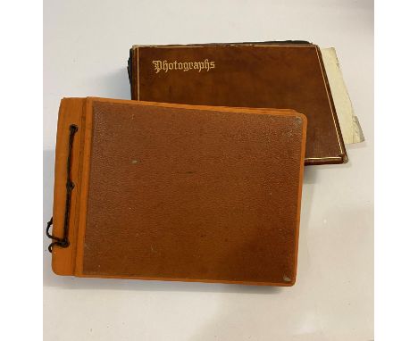 TWO PHOTOGRAPH ALBUMS BELONGING TO FLT L. ADCOCK. An album of photographs and postcards of Berlin in the years after the Seco
