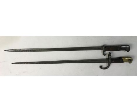 A GERMAN FIRST WORLD WAR M1898 LONG BAYONET AND ANOTHER. An M1898 bayonet with a 52cm fuller and pipe backed blade, stamped 1