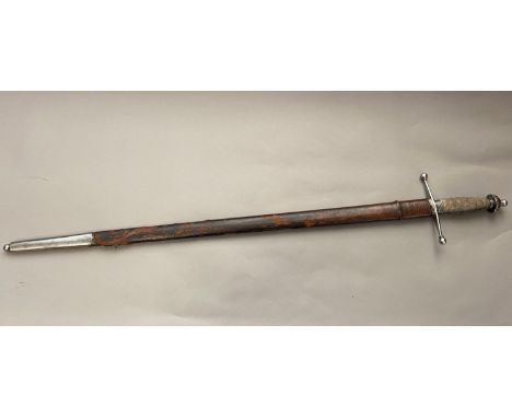 A LATE VICTORIAN SEAFORTH HIGHLANDERS CROSS-HILTED BROADSWORD AND SCABBARD. With an 84cm tapering pointed blade with partial 