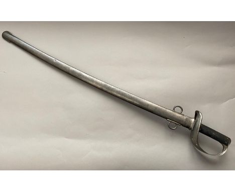 AN 1885 PATTERN TROOPERS CAVALRY SWORD AND SCABBARD. With an 87cm curved pointed and fullered blade with numerous stamped mar