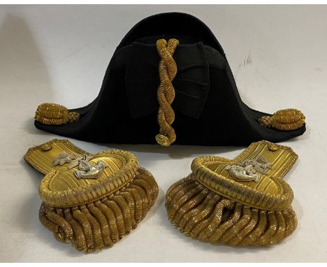 A VICTORIAN NAVAL OFFICERS COCKED HAT, EPAULETTES AND CASE. A Naval Officers cocked hat by Gievves Ltd, size 7 3/8, a pair of