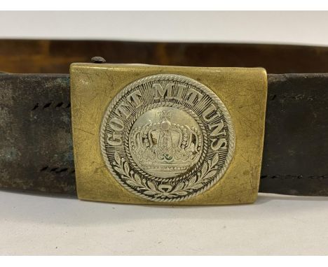 A FIRST WORLD WAR IMPERIAL GEMRAN BELT BUCKLE. The buckle with crown above a wreath and below 'Gorr Mit Uns' on a 4.5cm leath