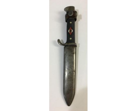 A SECOND WORLD WAR HITLER YOUTH KNIFE AND SCABBARD. With a 13.5cm sharpened pointed blade with motto 'Blut Und Ehre' (Blood a