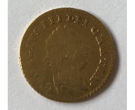 A GEORGE III THIRD GUINEA PIECE. A George III Third Guinea, first laureate head r, dated 1797. c2.8g.