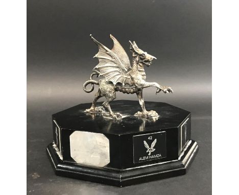 A WELSH GUNNERS PRESENTATION PIECE. A presentation award with a Welsh dragon with wings raised and front leg in attacking pos