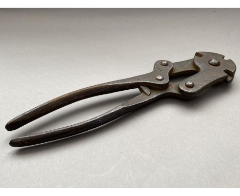 A PAIR OF FIRST WORLD WAR BARBED WIRE CUTTERS. Scissor action wire cutters with three cutting blades, stamped with a War Depa