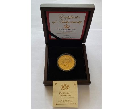 A ROYAL BABY 1 OZ GOLD COMMEMORATIVE COIN. A 22ct 1oz gold commemorative coin, proof contained in a capsule, the obverse 'Mag