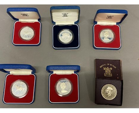 A COLLECTION OF SILVER PROOF CROWNS AND OTHERS. Two Silver Jubilee 1977 Proof silver crown, Two Guernsey 1978 Royal visit sil