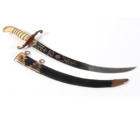 AN IVORY HANDLED NAVAL DIRK. With a 36cm curved pointed blade with blued and gilt decoration of a royal crown above Royal cyp