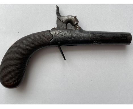 A 19TH CENTURY WAISTCOAT PISTOL. A small percussion action pistol with a 4cm screw off barrel, the circular body with an acti