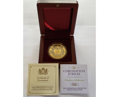 A GUERNSEY 2013 CORONATION JUBILEE GOLD £5.00 COIN. A 22ct Guernsey £5.00 gold coin, proof contained in a capsule, the obvers