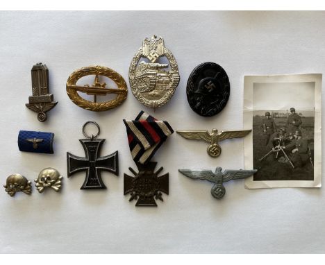 A 1914 IRON CROSS AND A COLLECTION OF OTHER GERMAN BADGES AND MEDALS. A Great War Iron Cross, 2nd Class dated 1914 and 1813, 