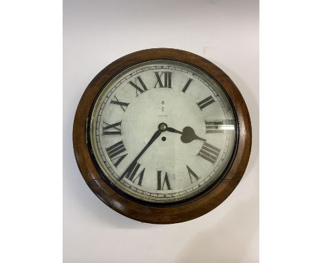 AN UNUSUALLY LARGE MILITARY WALL CLOCK. With a 33cm white enamelled dial with Roman numerals, with government arrow, I and RE