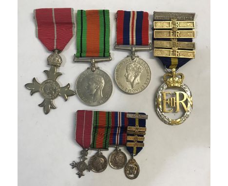 A SECOND WORLD WAR MBE GROUP OF FOUR AND MINIATURES.A group of four comprising MBE on military ribbon, Second World War Defen