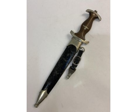 A SECOND WORLD WAR GERMAN SA DAGGER. A Second World War or later SA Dagger, with a 22 cm RZM pointed double edged blade etche