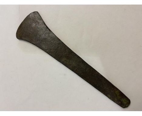 A BRONZE AGE COPPER FLAT AXEHEAD. 3rd - 2nd Millennium BC, with a tapering rectangular section body and flared cutting edge w