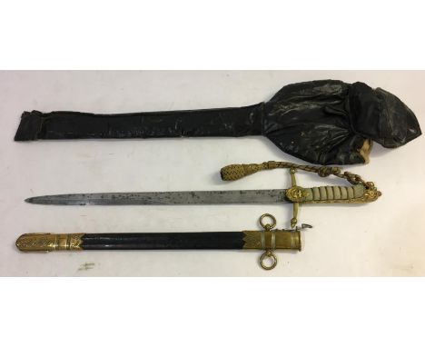 AN EDWARD VII NAVAL DIRK AND SCABBARD. An Edward VII Midshipman's Dirk with a 45cm pointed decorated blade with Royal cypher 