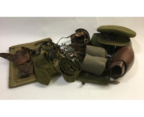 A COLLECTION OF DORSET A.C.F. UNIFORM AND ACCESSORIES. Including a four button khaki jacket with 'The Dorsetshire Regt' butto