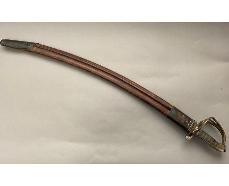 A MOUNTAIN ARTILLERY OFFICERS SWORD AND MARK II SCABBARD. With a 78cm sabre type curved, pointed and fullered blade with shar