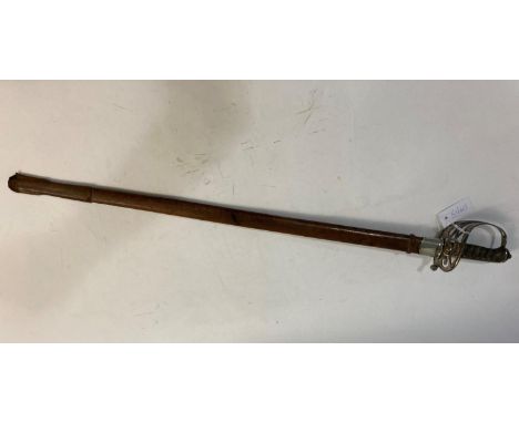 AN 1854 PATTERN GRENADIER GUARDS SWORD AND SCABBARD BY HENRY WILKINSON. With an 82cm straight fullered blade tapering to a fi